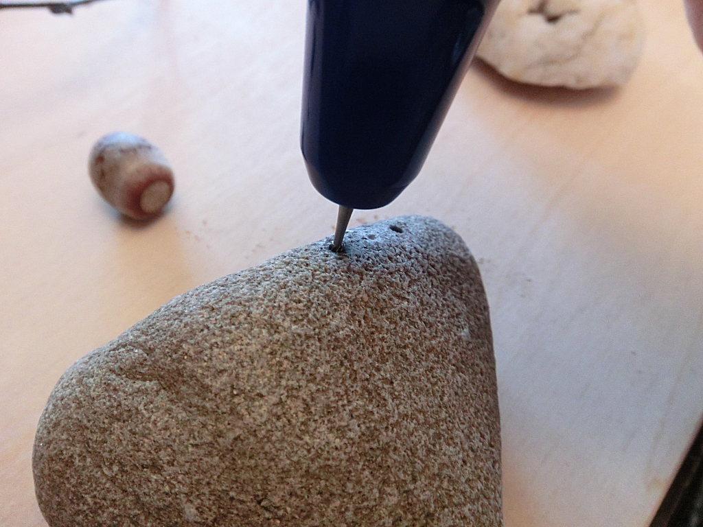 Make stone monster with branches - drilling holes in the stone with the Hobby Drill by Pebaro